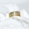 ad_lineas1 Anillo Multilínea Texturizado en Dorado y Plateado