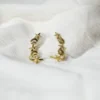 base_edasdcdsicion Pendiente ear cuff estrellas y conchas acero
