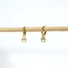 base_eddsaefrvicion Pendientes aro con charm huella acero inoxidable