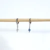 base_ediscsdvcion Pendientes aro con charm rayo acero inoxidable