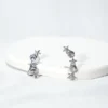 base_fjhvedikhbcion Pendiente ear cuff estrellas y conchas acero