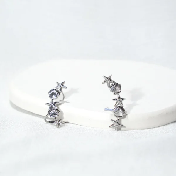 base_fjhvedikhbcion Pendiente ear cuff estrellas y conchas acero